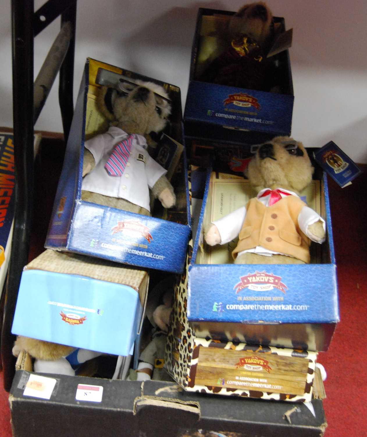 Lot 87 - A box of mixed stuffed Meercat toys