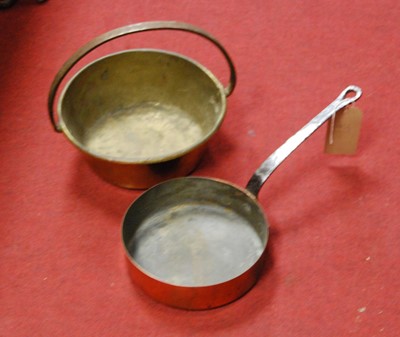 Lot 102 - A 19th century copper pan together with a...