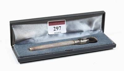 Lot 297 - A 20th century continental silver can-opener,...
