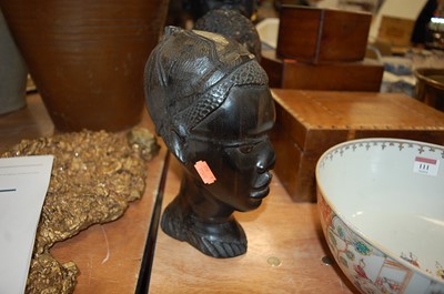 Lot 109 - An African carved hardwood head of a man,...