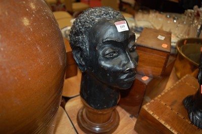 Lot 109 - An African carved hardwood head of a man,...