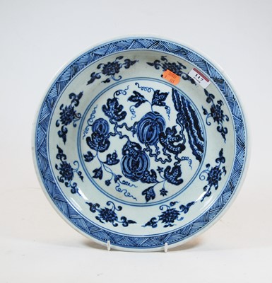 Lot 117 - A Chinese export blue & white dish decorated...