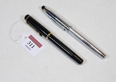 Lot 311 - A Pelikan fountain pen, having black barrel,...