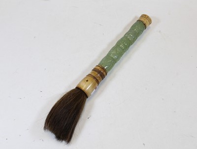 Lot 312 - A calligraphy brush, having sectional carved...