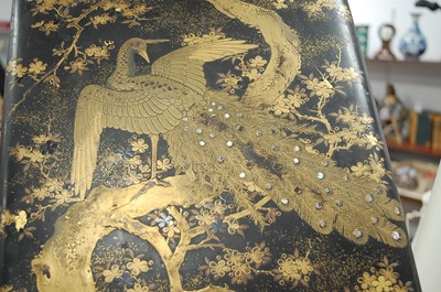 Lot 150 - A Chinese black lacquered panel, decorated in...