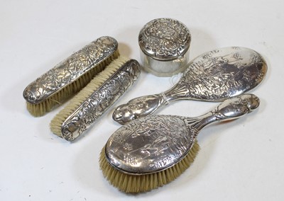 Lot 317 - A late Victorian five-piece silver mounted...