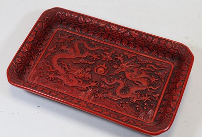 Lot 323 - A Chinese export red cinnabar lacquer tray, of...