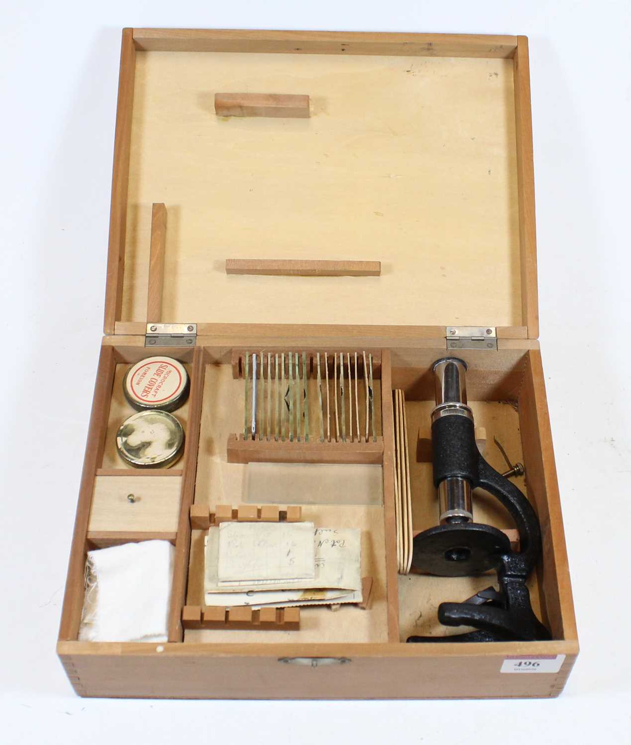 Lot 496 - A student's monocular microscope in fitted...
