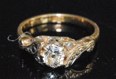 Lot 2592 - A yellow metal diamond single stone ring,...