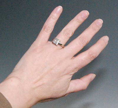 Lot 2595 - A white metal diamond quatrefoil cluster ring,...