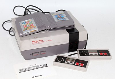 Lot 3163 - An original Nintendo NES console with two...