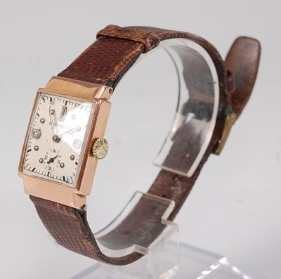 Lot 2555 - A vintage gent's Longines 14ct gold cased tank...