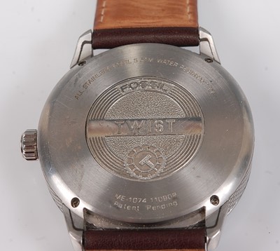Lot 2561 - A gent's Fossil steel cased 'twist' automatic...