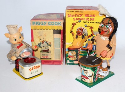 Lot 3188 - A tinplate and battery operated Japanese toy...