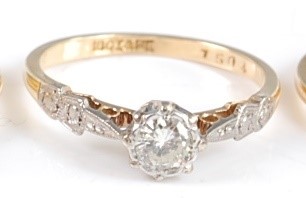 Lot 2664 - An 18ct gold diamond solitaire ring, the...