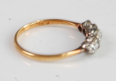 Lot 2665 - An 18ct gold diamond five stone ring, the claw...