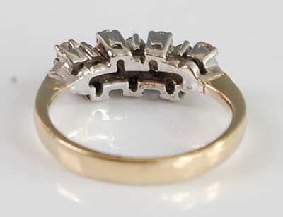 Lot 2674 - A yellow metal diamond half hoop ring,...