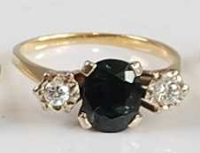 Lot 2675 - A yellow metal, alexandrite and white sapphire...