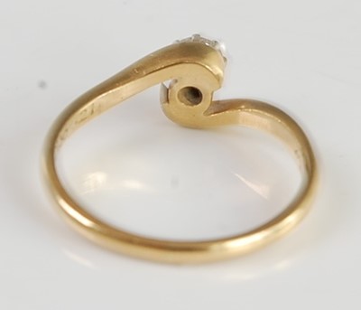 Lot 2691 - An 18ct gold diamond solitaire ring, the claw...
