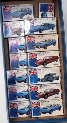 Lot 2675 - 16 various boxed Tomica 1/63 and 1/59 scale...