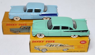 Lot 2053 - A Dinky Toys boxed saloon diecast group, two...