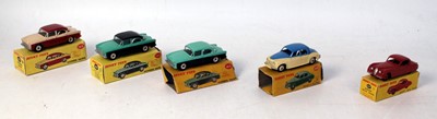 Lot 2057 - Five various boxed Dinky Toy diecast saloons,...