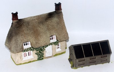 Lot 1296 - A resin and plaster home made farm cottage...