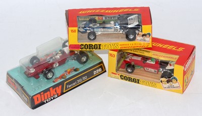 Lot 1665 - A Corgi Toys and Dinky Toys boxed F1 race car...