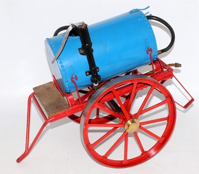 Lot 77 - A 2 inch scale water cart/water pump, red...