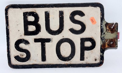 Lot 79 - A double sided cast iron bus stop sign black...