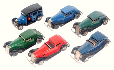 Lot 3214 - A Triang Minic and clockwork taxi and saloon...