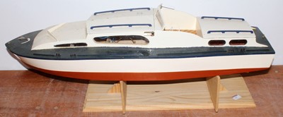 Lot 65 - A wooden cabin cruiser approx 34" long on...