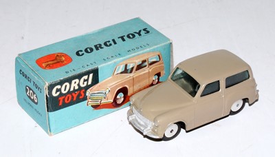 Lot 1673 - A Corgi Toys No. 206 Hillman Husky comprising...