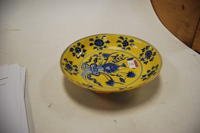 Lot 11 - A Chinese export yellow and blue glazed...