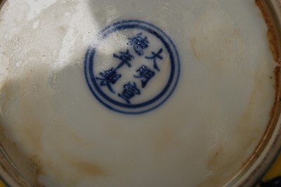 Lot 11 - A Chinese export yellow and blue glazed...