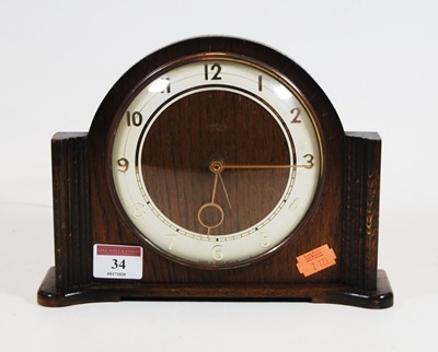 Lot 34 - A 1930s oak cased Smiths electric mantel clock,...