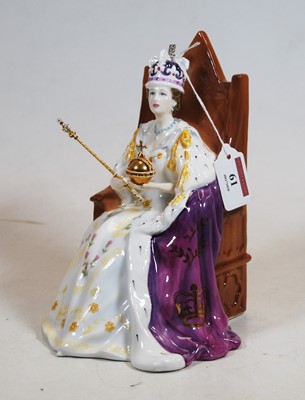 Lot 61 - A Royal Doulton porcelain figure of Queen...