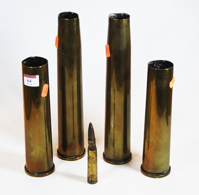Lot 64 - A collection of five various brass shell cases,...