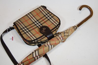 Lot 131 - A Burberry? tartan handbag, together with a...