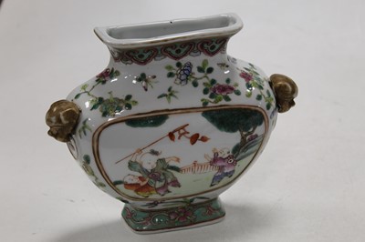Lot 171 - A pair of Chinese famille verte urn shaped...