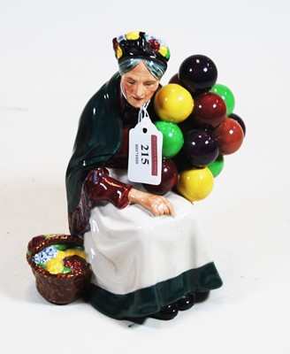 Lot 215 - A Royal Doulton figurine, The Old Balloon...