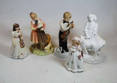 Lot 219 - A collection of four Royal Doulton figurines...
