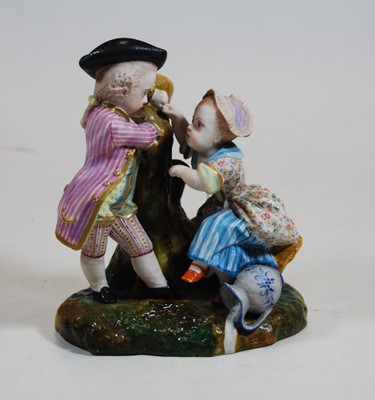 Lot 220 - An early 20th century bisque porcelain figure...