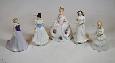 Lot 238 - A collection of five Royal Doulton figurines...