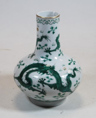 Lot 253 - A Chinese export vase, having a slender neck...