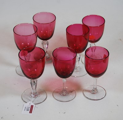 Lot 255 - Five Victorian cranberry glass wine hocks,...