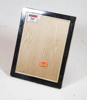 Lot 265 - A modern silver clad easel photograph frame,...