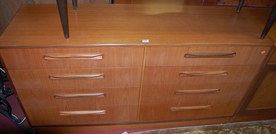 Lot 1247 - A 1970s G-Plan teak long side chest, fitted...