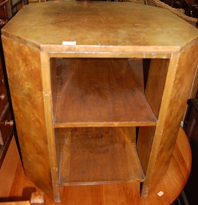 Lot 1253 - An Art Deco figured walnut octagonal book...