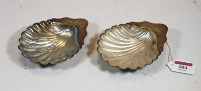 Lot 284 - A pair of Victorian silver shell shaped butter...
